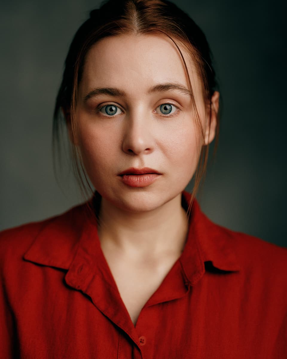 Theatrical headshot expressive close crop studio portrait