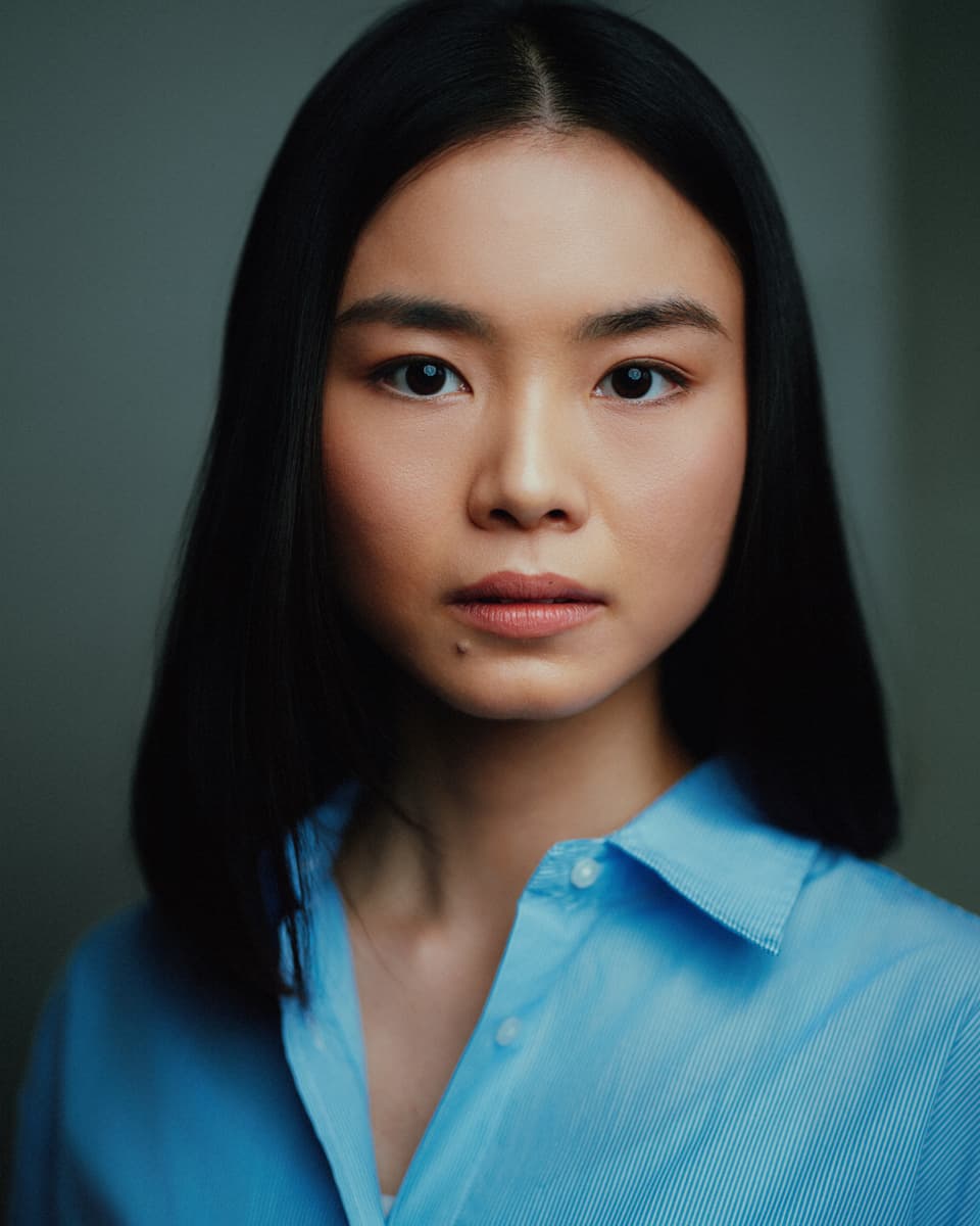 Toronto actress headshot with a natural expression in soft studio light