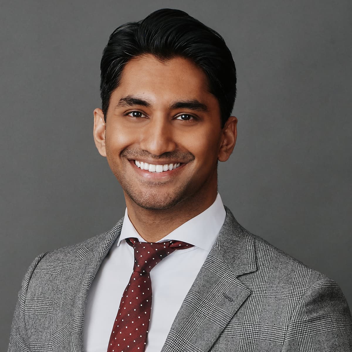 Corporate headshot man white shirt minimal backdrop