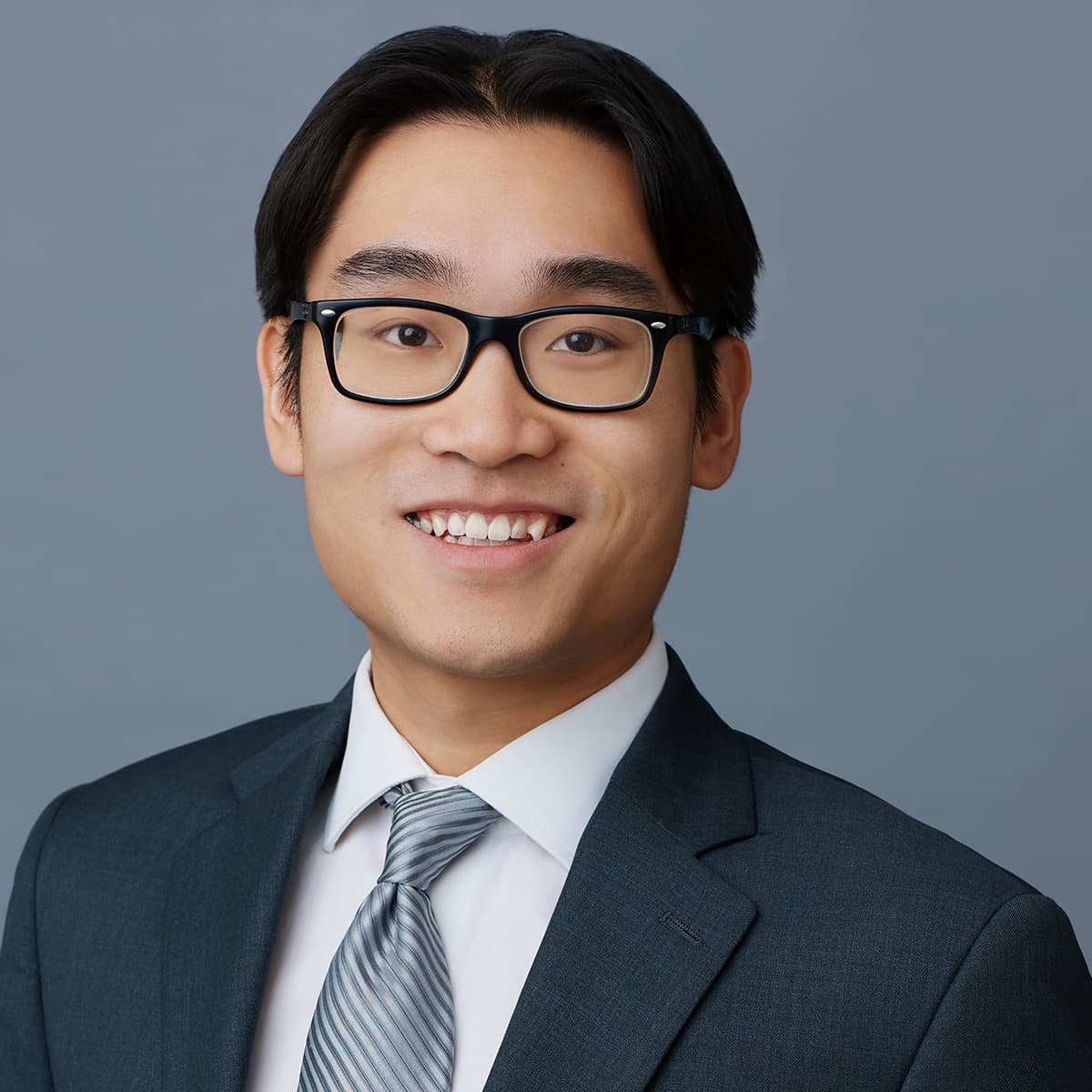 Corporate portrait man casual blazer relaxed studio