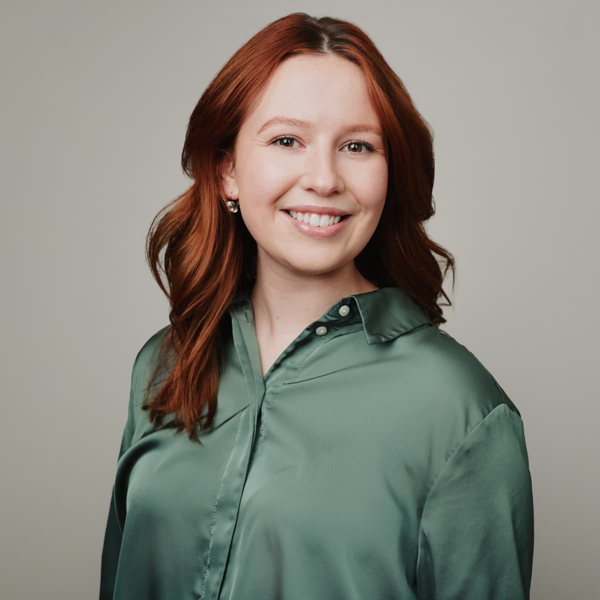 Corporate headshot woman confident expression