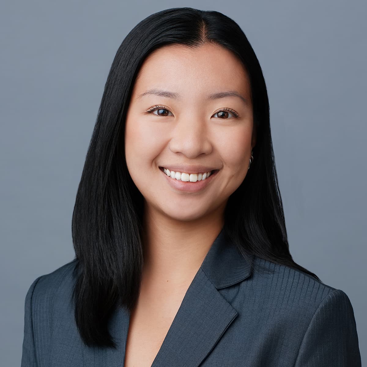 Toronto corporate headshot woman layered blazer studio