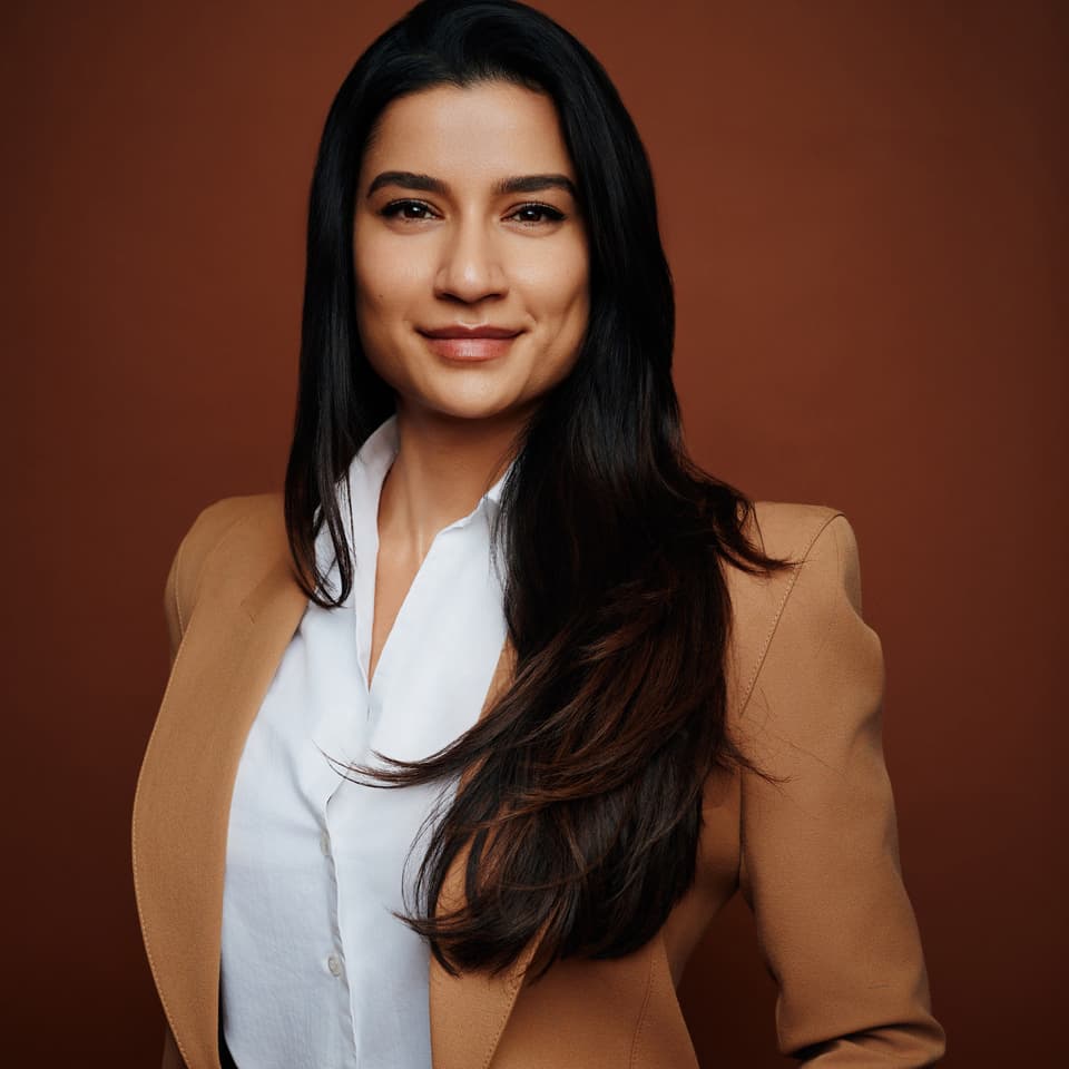 Confident Toronto corporate headshot of a team lead in a professional studio setting