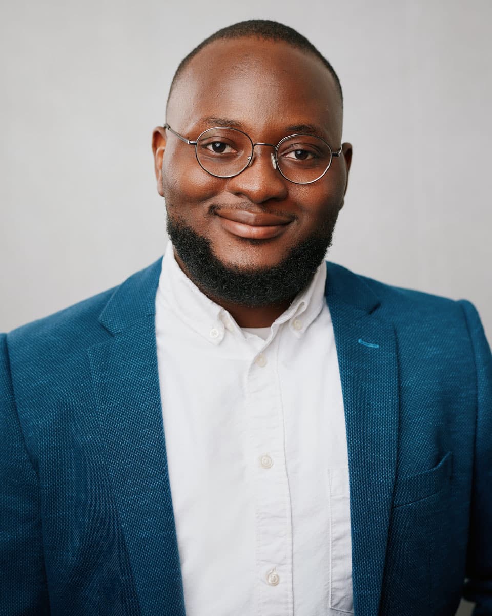 Toronto corporate headshot of a bearded man photographed in a clean modern studio with a polished and confident expression