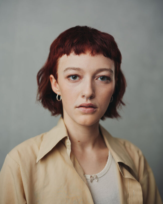red headed woman with bangs